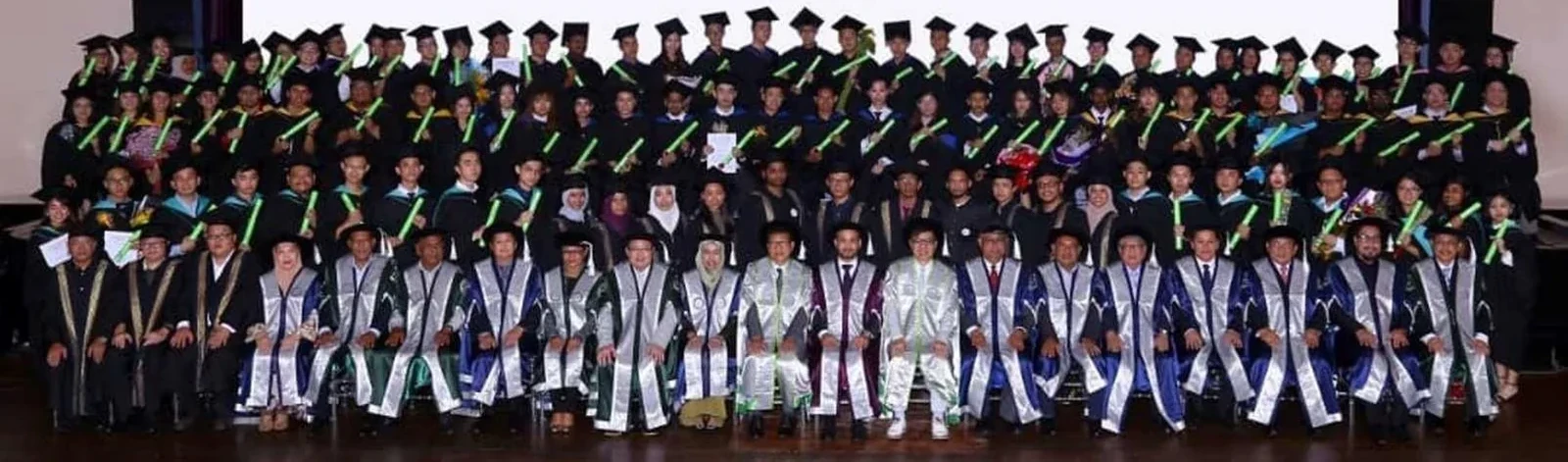 Graduates on stage at a College of Future convocation ceremony